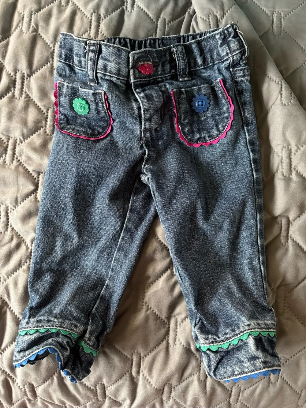 Baby girl jeans with colorful buttons